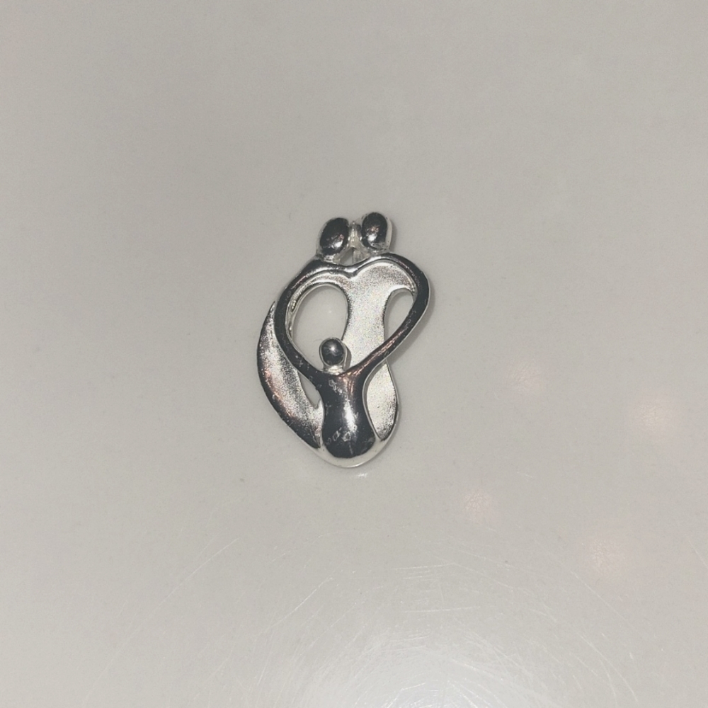Gently used -Sterling Silver Parents and child Family Pendant